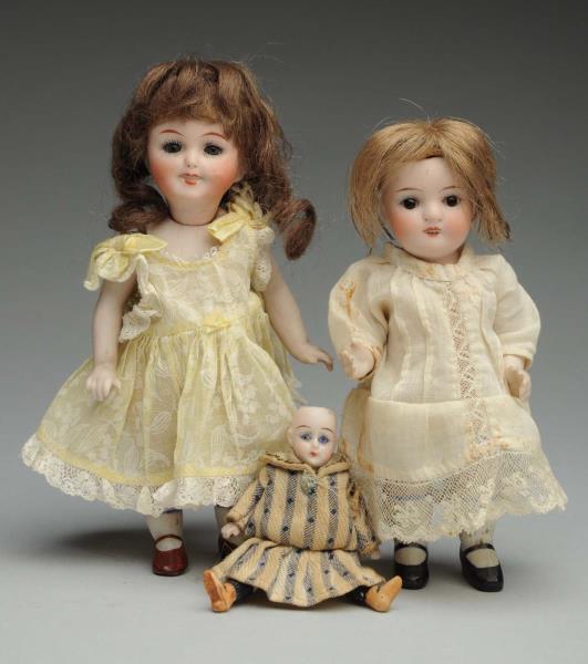 Appraisal: Lot Of German All-Bisque Dolls ABG girl incised with sleeping