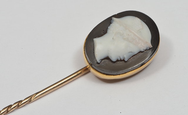 Appraisal: A TH CENTURY GILT TIE PIN decorated with a glass