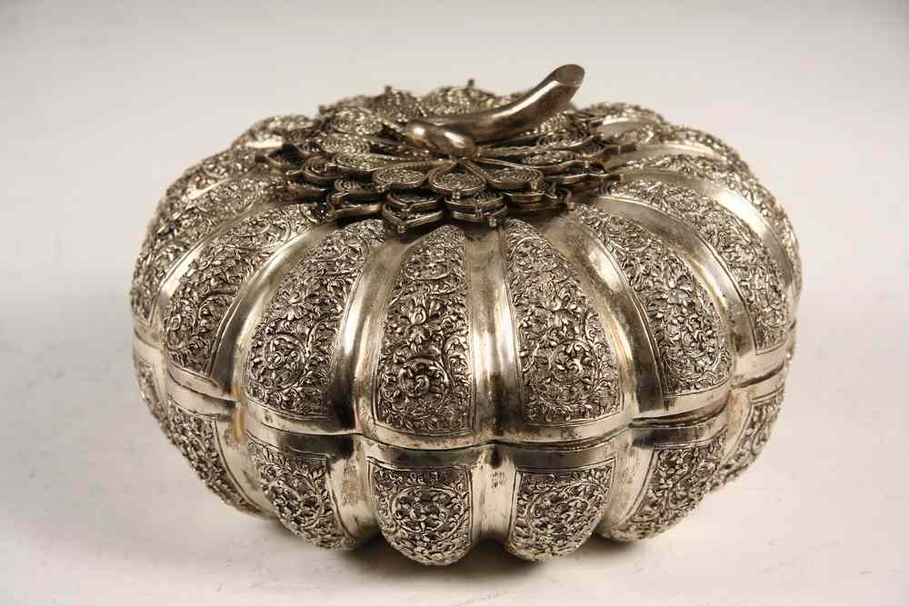 Appraisal: PERSIAN SILVER MELON FORM BOX - Repousse and Chased Melon