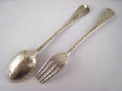 Appraisal: Victorian silver christening spoon and fork set decorated with foliate