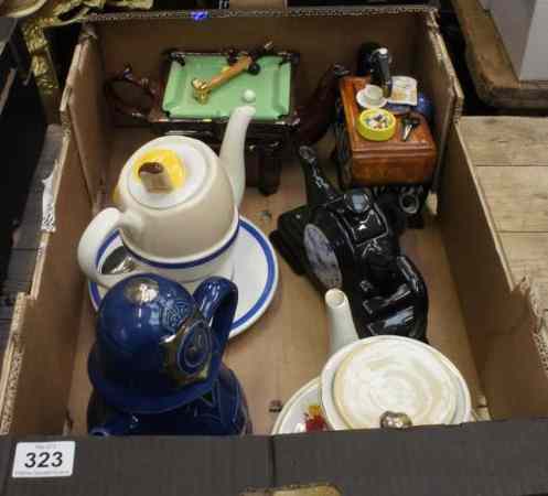 Appraisal: A collection of various Character Tea Pots comprising South West