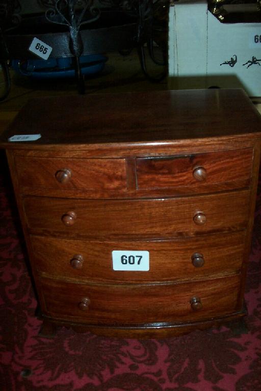 Appraisal: A th century style mahogany miniature bow fronted chest of