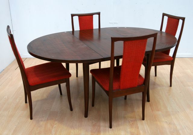 Appraisal: A stained pine extension dining table by Parker Furniture circa