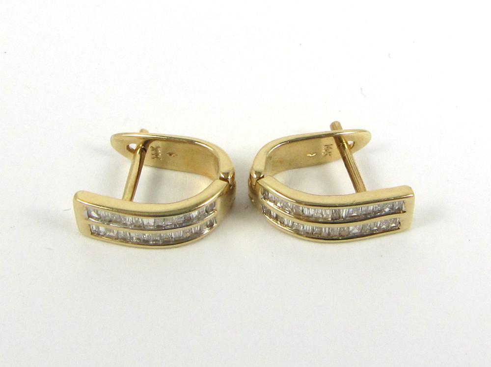 Appraisal: PAIR OF DIAMOND AND FOURTEEN KARAT GOLD EARRINGS each huggie