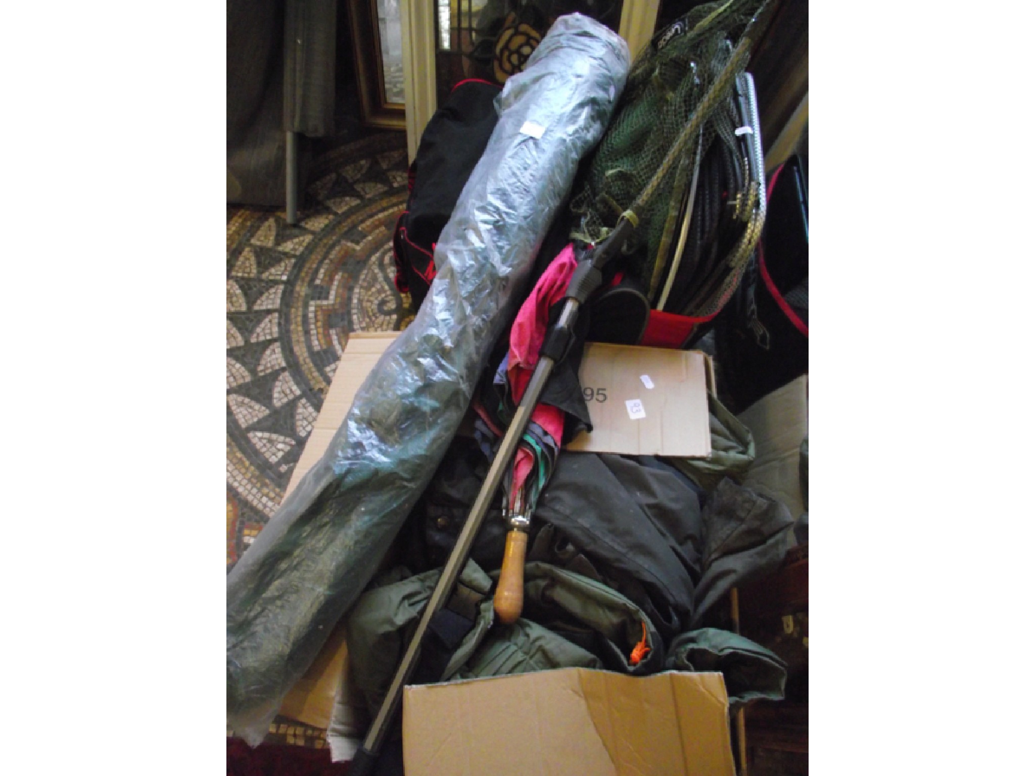 Appraisal: A selection of outdoor clothing including coats trousers umbrellas etc