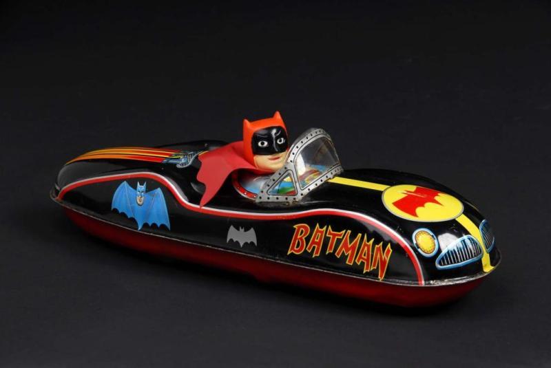 Appraisal: Batman Racer Toy Description Japanese Made by Masudaya Working When