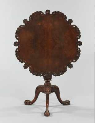 Appraisal: A Chippendale Style Tilt Top Tea Table Elaborately carved serpentine