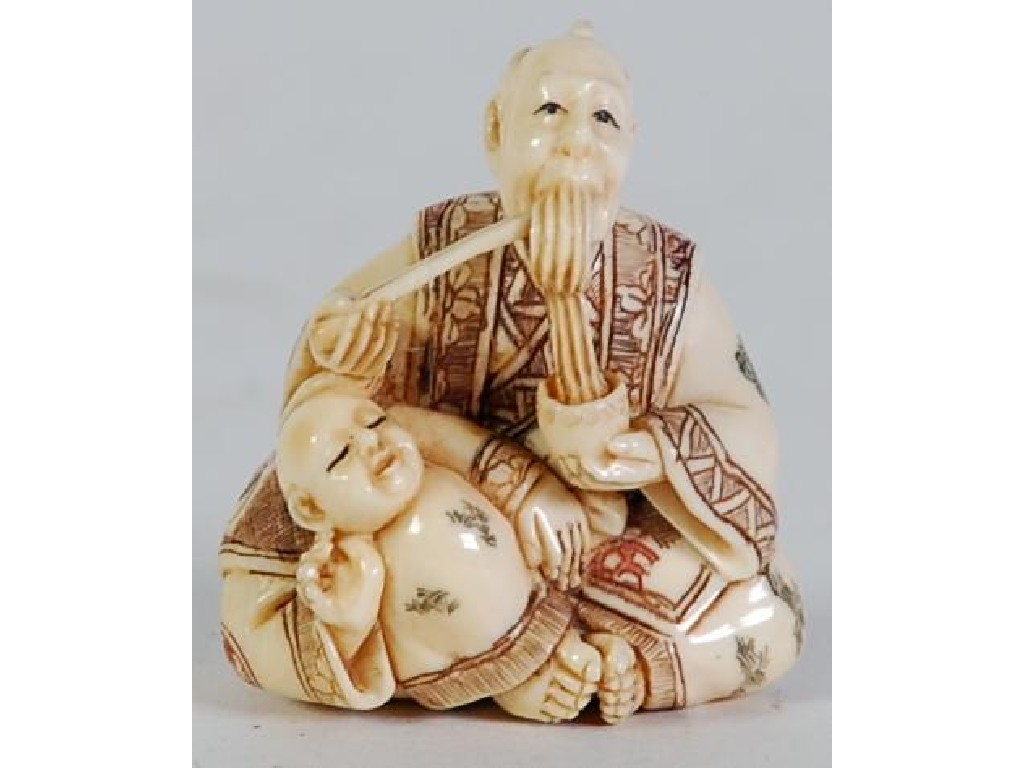 Appraisal: TWENTIETH CENTURY JAPANESE CARVED AND INCISED IVORY NETSUKE of a