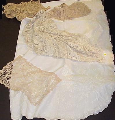 Appraisal: Group of lace and cutwork tablecloths and runners ten damask