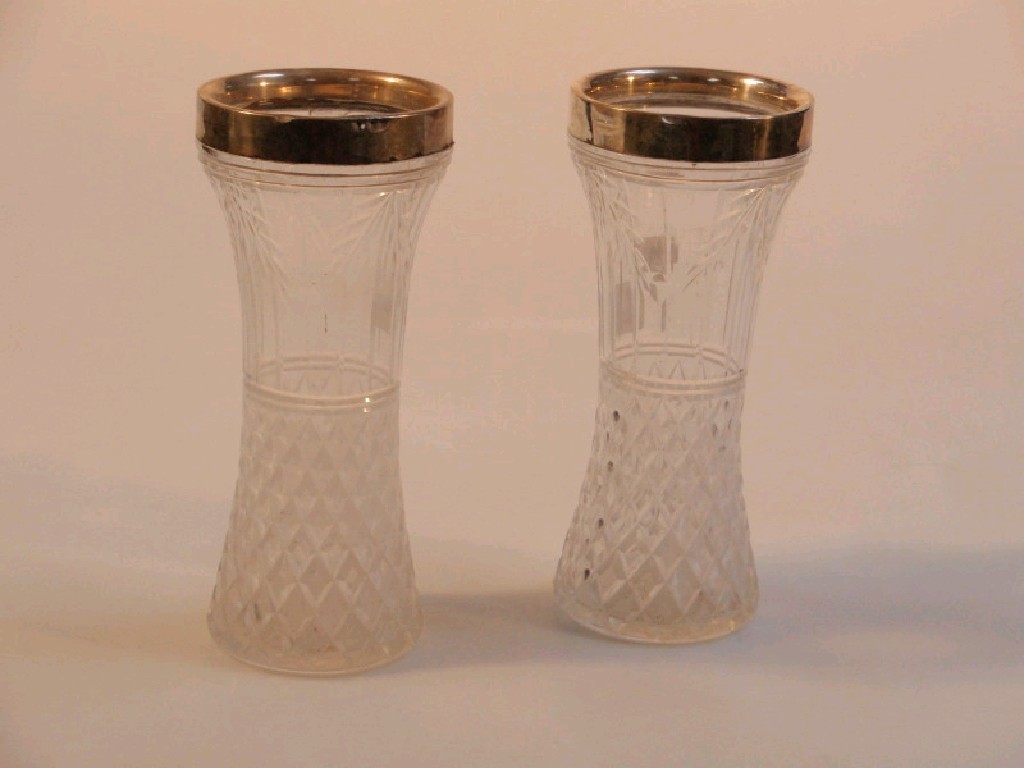 Appraisal: A pair of early thC cut glass waisted vases with