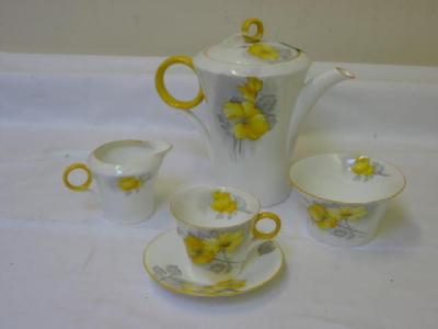 Appraisal: A SHELLEY CHINA REGENT SHAPE COFFEE SET printed and overpainted