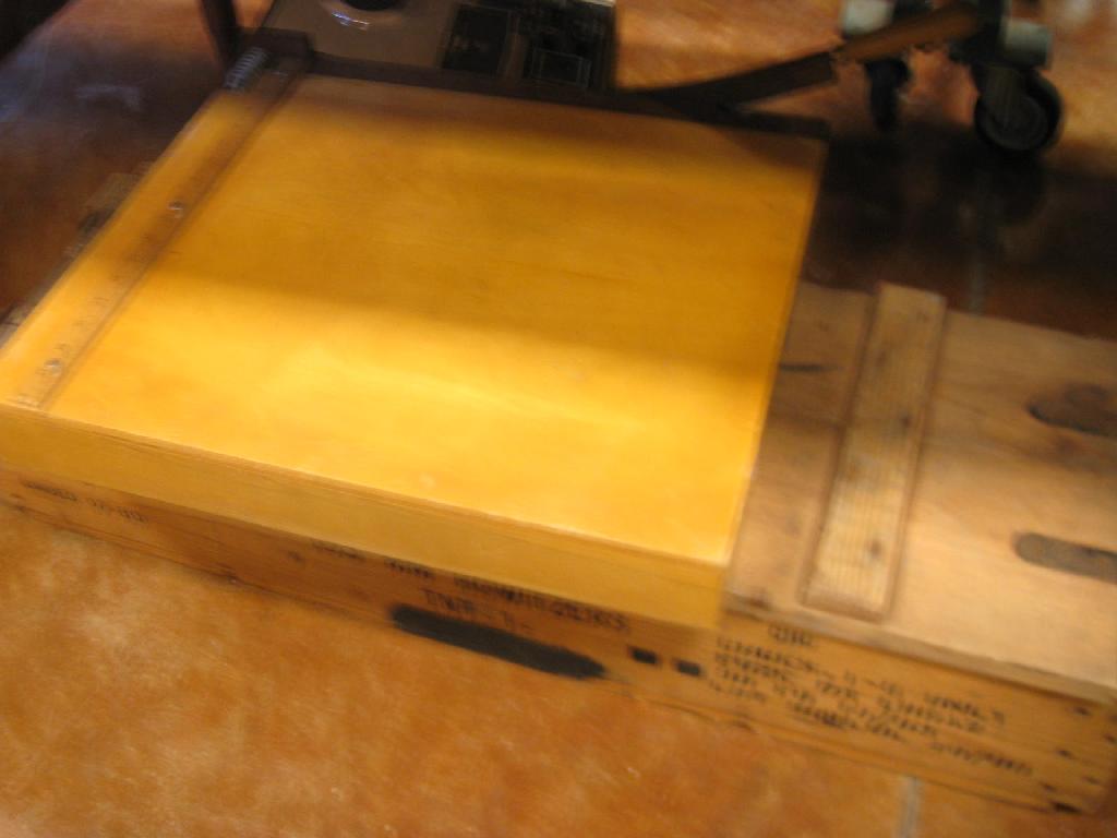 Appraisal: A wooden box with Tripod Parts a large paper Guillotine