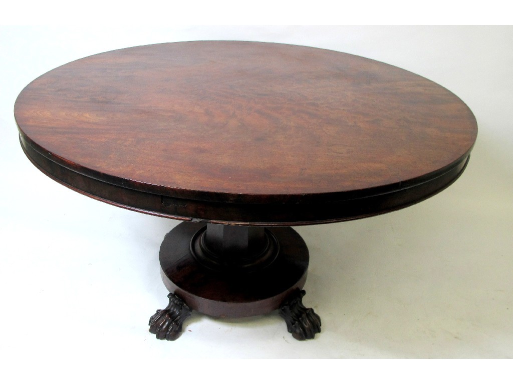 Appraisal: A Victorian mahogany breakfast table the circular top raised over