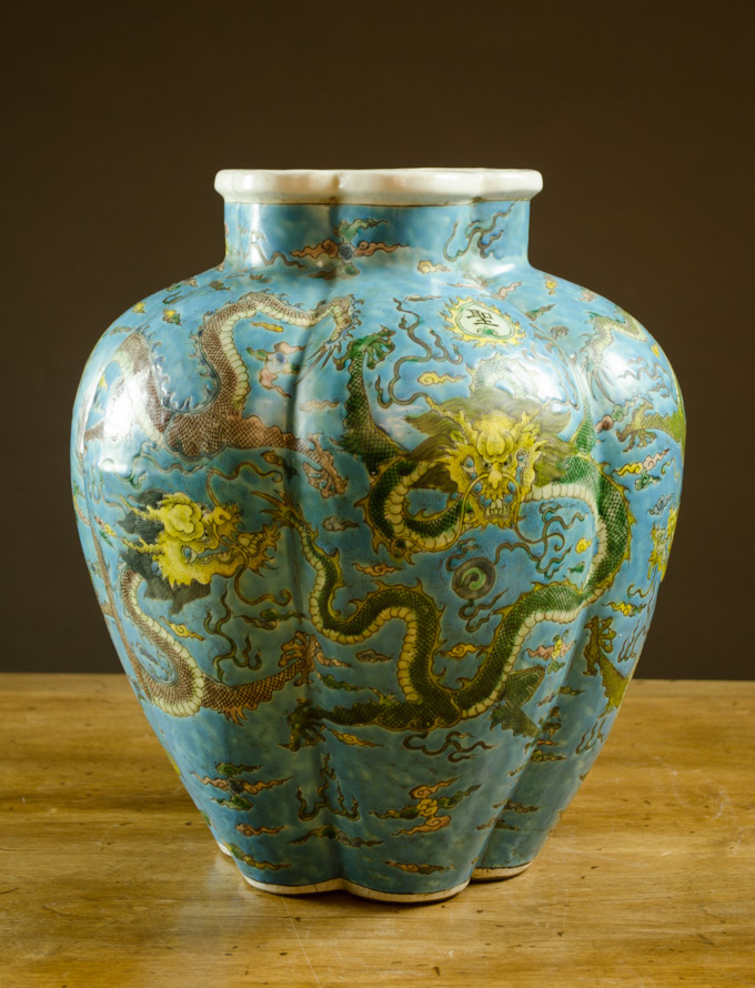 Appraisal: CHINESE LOBBED PORCELAIN VASE the sides decorated with green and