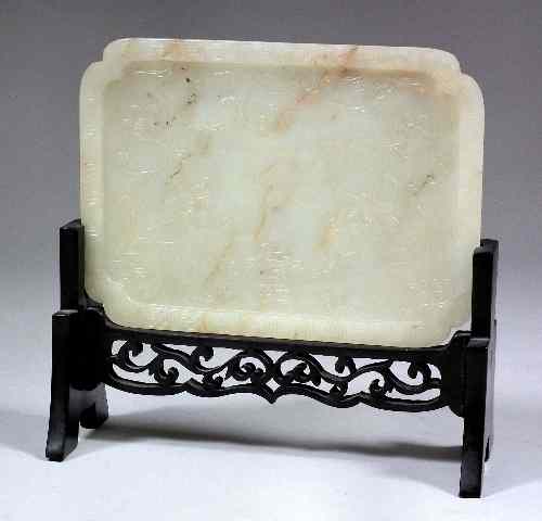 Appraisal: A Chinese celadon jade rectangular ''Happiness'' plaque carved with flowers