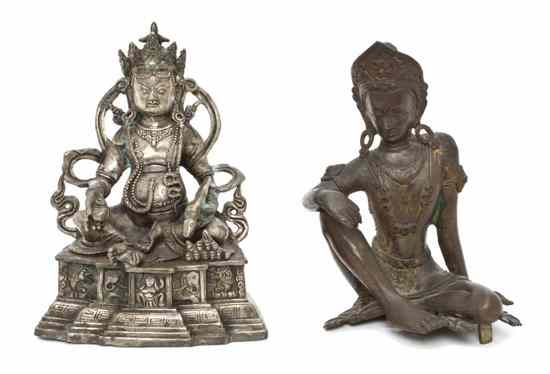 Appraisal: A South East Asian White Metal Seated Figure depicted wearing