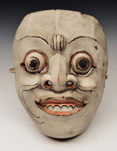 Appraisal: A BALINESE WHITE PAINTED WOODEN THEATRE MASK with highlighted decoration