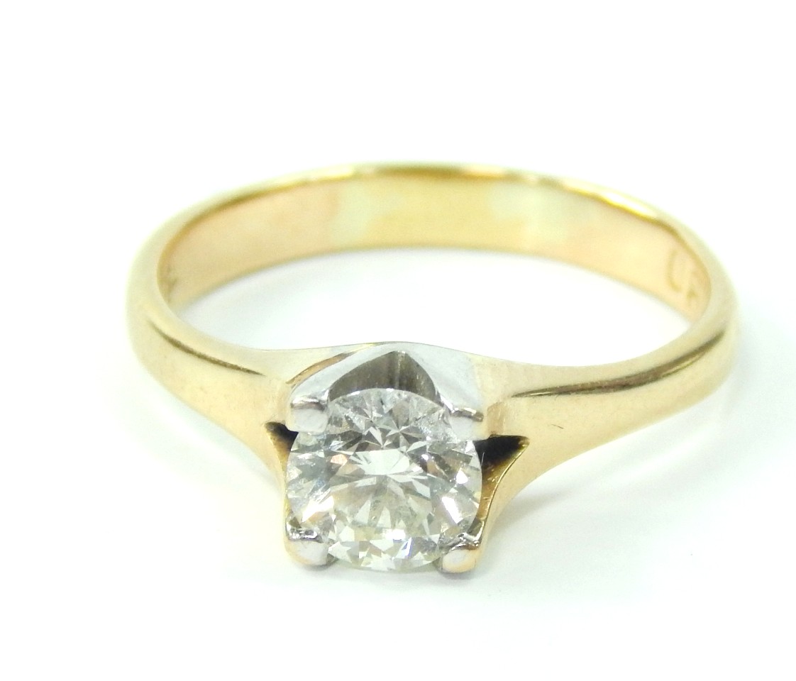 Appraisal: A yellow metal and diamond solitaire ring claw set approx