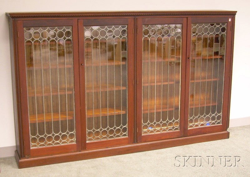 Appraisal: Early th Century Leaded Glass Four-Door Carved Mahogany Bookcase with