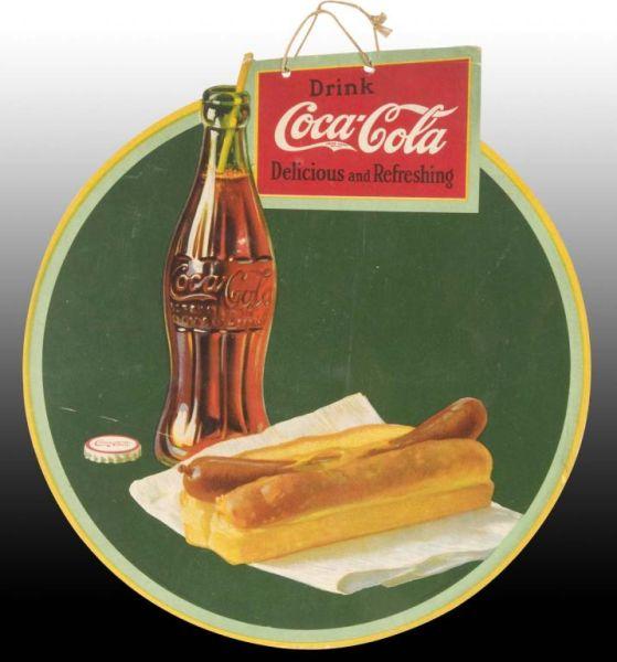 Appraisal: Coca-Cola Die-Cut Cardboard Sign Description Featuring bottle and hotdog A