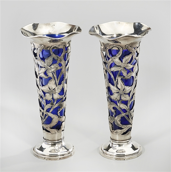 Appraisal: Pair of sterling openwork floral design trumpet vases monogrammed with