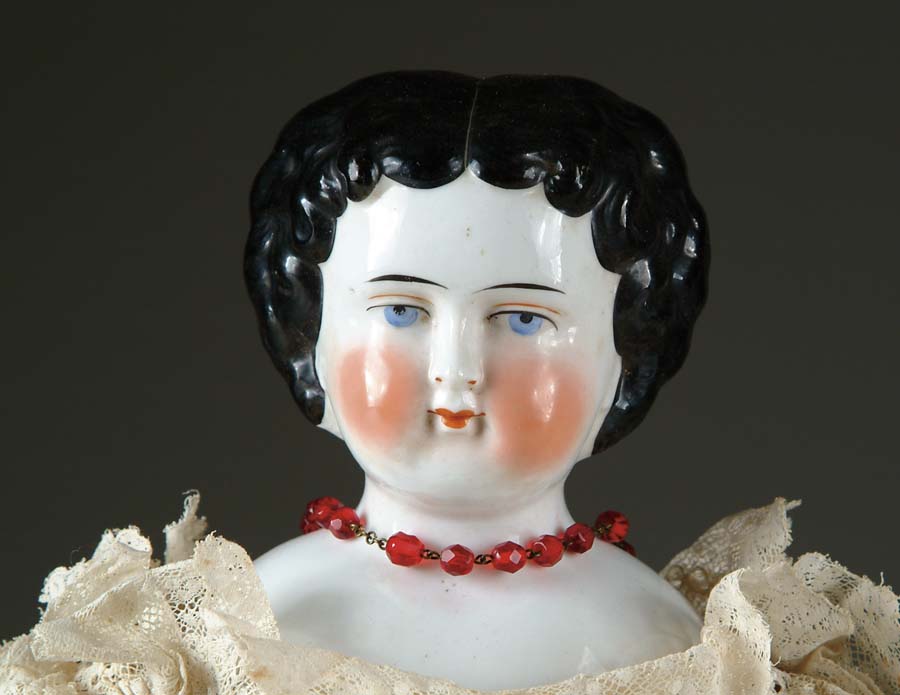 Appraisal: CIVIL WAR ERA CHINA HEAD DOLL Flat-topped china with center