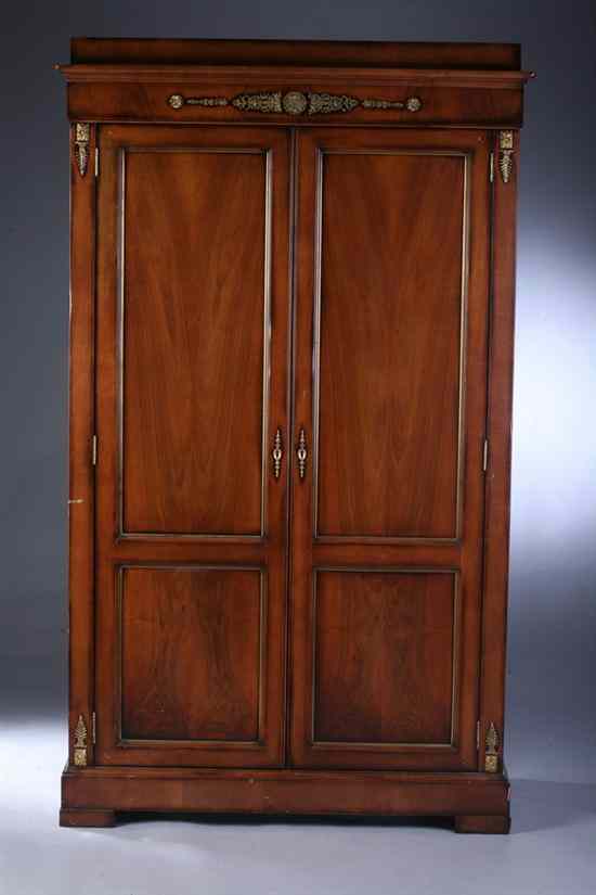 Appraisal: ITALIAN CONTEMPORARY WALNUT ARMOIRE Molded cornice over gilt-metal detailing two