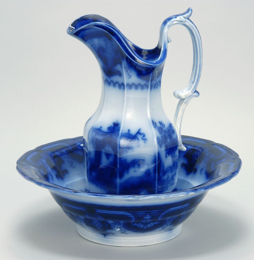 Appraisal: FLOW BLUE WASHBOWL AND PITCHER By T J J Meyer