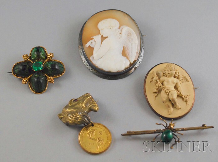 Appraisal: Five Victorian Brooches a large silver-framed shell-carved cameo damage a