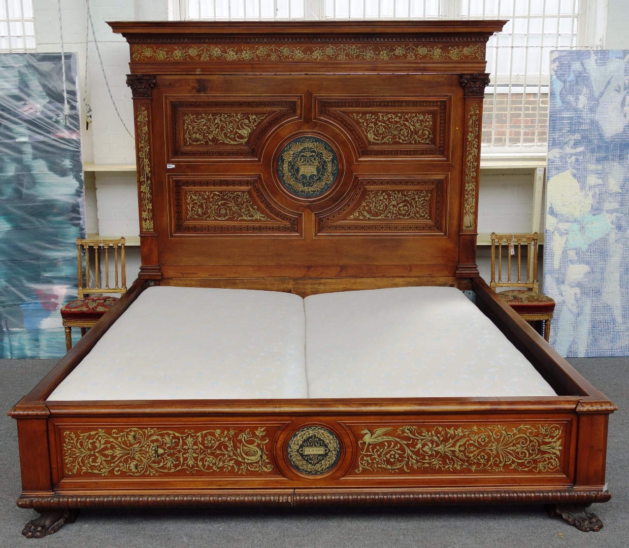 Appraisal: A th century and later carved Italian walnut bed with