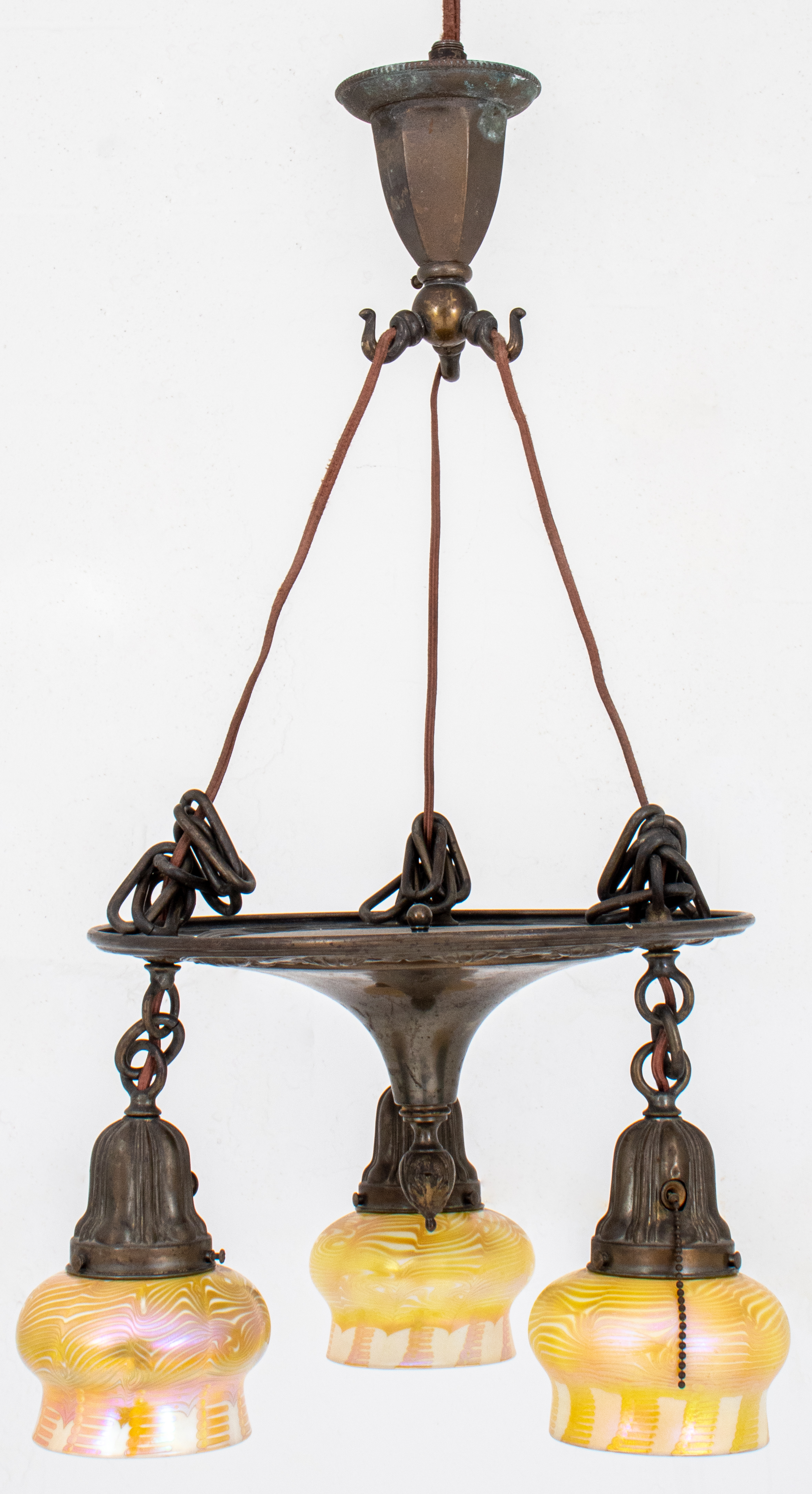 Appraisal: ART NOUVEAU BRASS -ARM QUEZAL-SHADED CHANDELIER Art Nouveau patinated brass