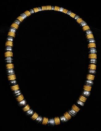 Appraisal: BLACK BAROQUE PEARL AND GOLD BEAD NECKLACE in Provenance Property