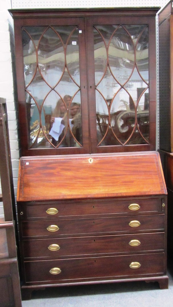 Appraisal: A George III mahogany bureau bookcase the pair of astragal