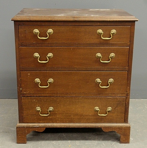 Appraisal: - Miniature Chippendale style mahogany chest of drawers h x