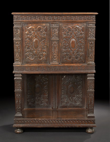 Appraisal: Italian Highly Carved Oak Cupboard late th century in the