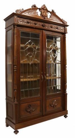 Appraisal: French Henri II style walnut bookcase th c having a