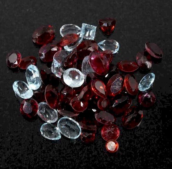 Appraisal: ct of Unmounted Faceted Aqua-Marine Garnet Featured in this lot