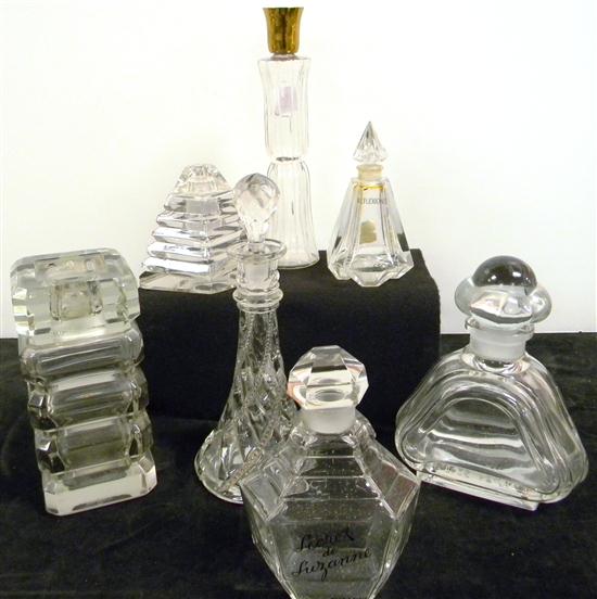 Appraisal: Commerical perfume bottles including large bottles includes a Secret de