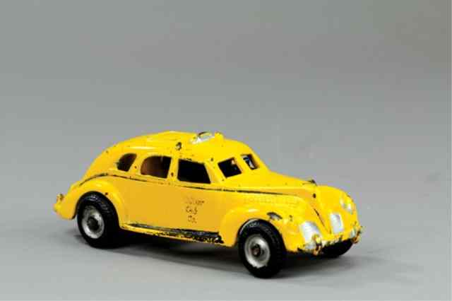 Appraisal: ARCADE YELLOW CAB Cast iron painted in yellow overall cast