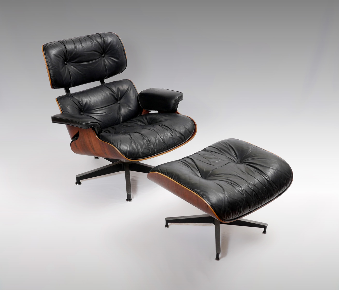 Appraisal: HERMAN MILLER LEATHER EAMES CHAIR AND OTTOMAN Black leather chair