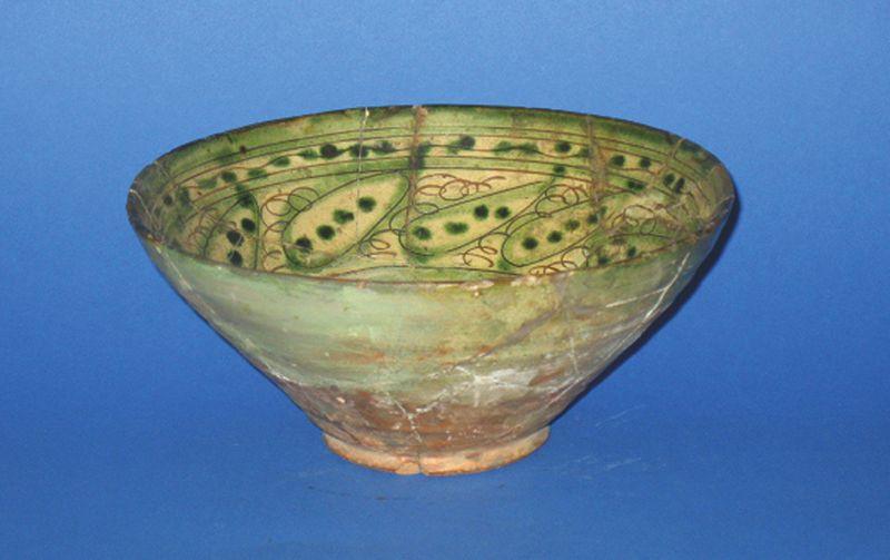 Appraisal: A PERSIAN POTTERY BOWL with sgraffito decoration of stylised leaves