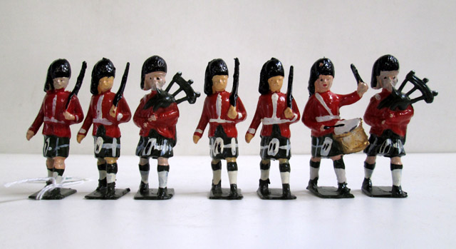 Appraisal: THREE SETS OF TOY SOLDIERS twenty-three pieces box of Britains