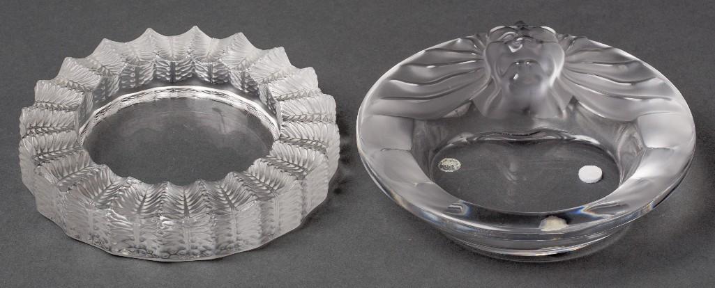 Appraisal: LALIQUE CRYSTAL TETE DE LION AND JAMAIQUE ASHTRAYS Both signed