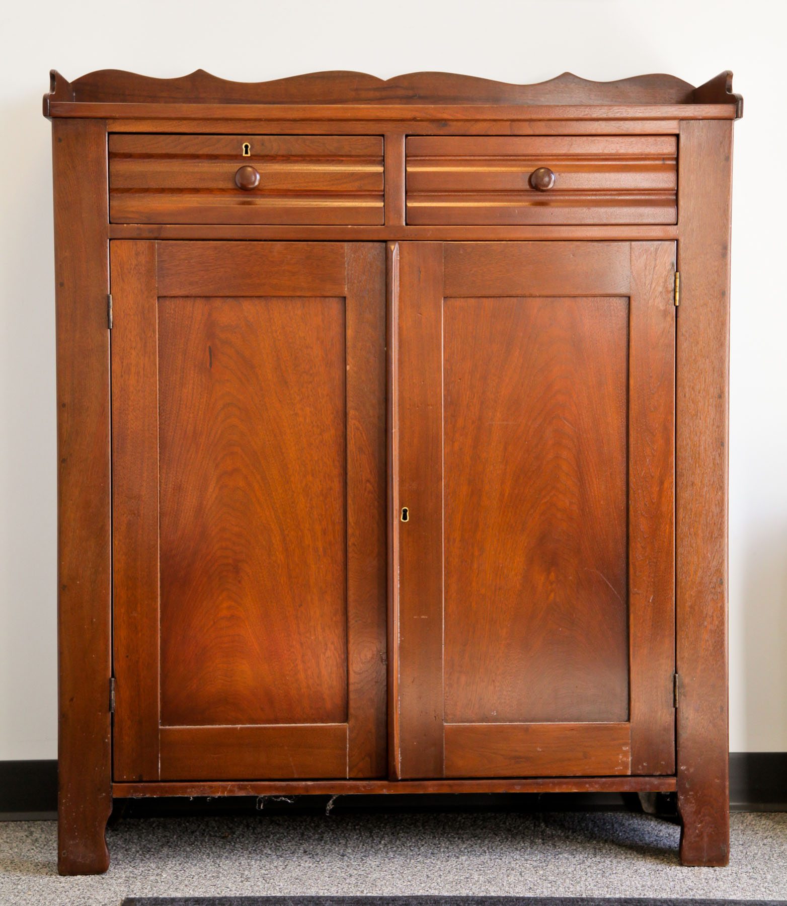 Appraisal: JELLY CUPBOARD American late th century walnut Shaped galler two