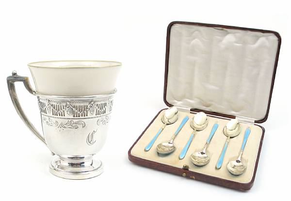 Appraisal: A sterling set of twelve demitasse cup frames and saucers