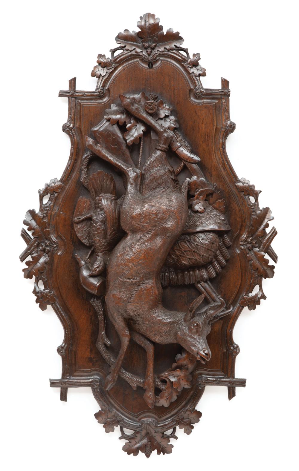 Appraisal: Large Black Forest Carved Walnut Wall Plaque c oak leaf