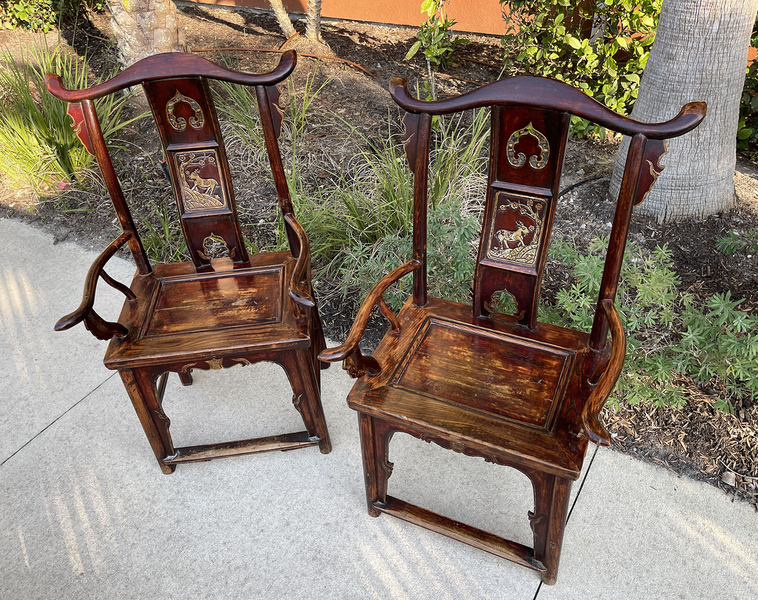 Appraisal: PAIR OF CHINESE ARMCHAIRS openwork splat with carved deer mortise-and-tenon