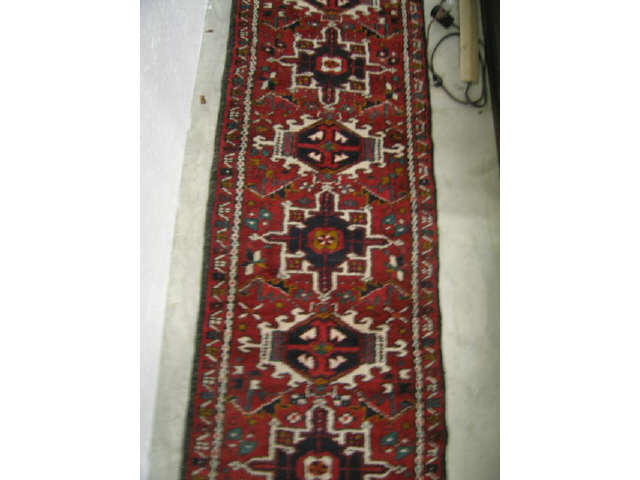 Appraisal: Heriz Persian Handmade Runner overall geometrics on red field '