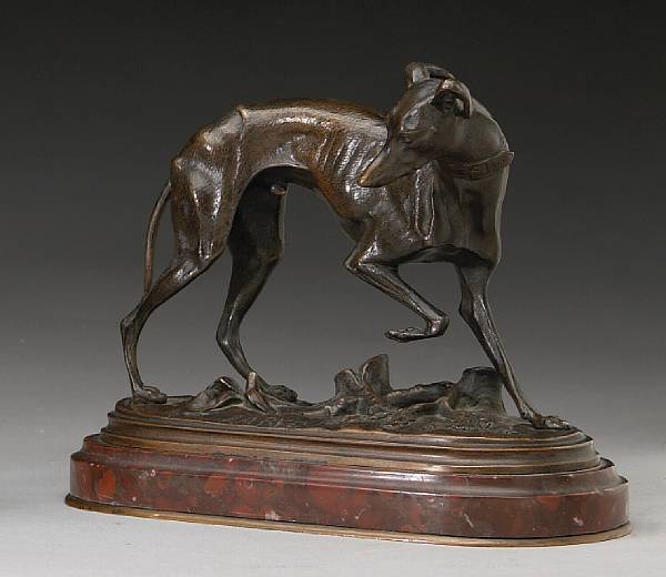 Appraisal: A patinated bronze animalier study of a whippet cast after