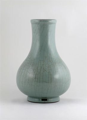 Appraisal: A Chinese pear-shaped vase with a tall flared neck decorated